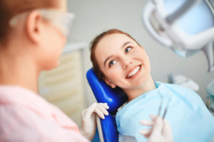 Happy patient smiling after visit with Dr. Gallagher and Kuhn dentist in Westminster Carroll County MD