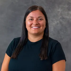 Smiling dental team member providing care at Carroll County dentist Gallagher & Kuhn Dental